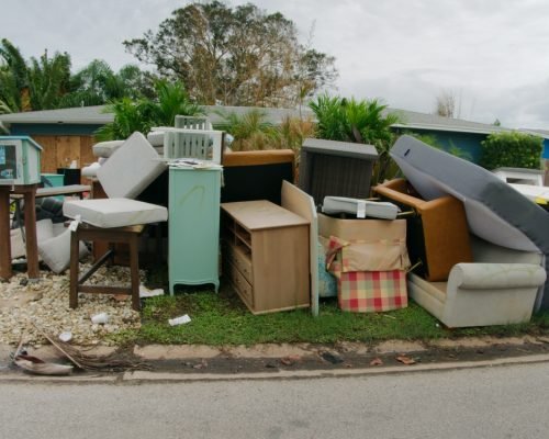 Large,Piles,Of,Trash,,Furniture,,Household,Items,Stacked,On,Side